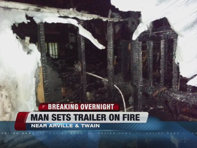 Man sets his own trailer on fire