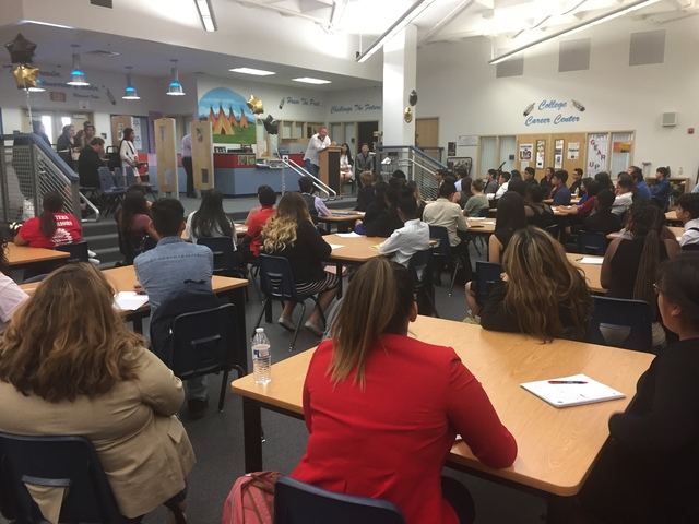 Businessman pays for caps and gowns for at-risk Western High students